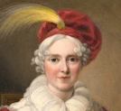 "Helena z Przeździeckich Radziwiłłowa (1752-1821) o siwych włosach, w czerwonej sukni, siedząca na krześle".